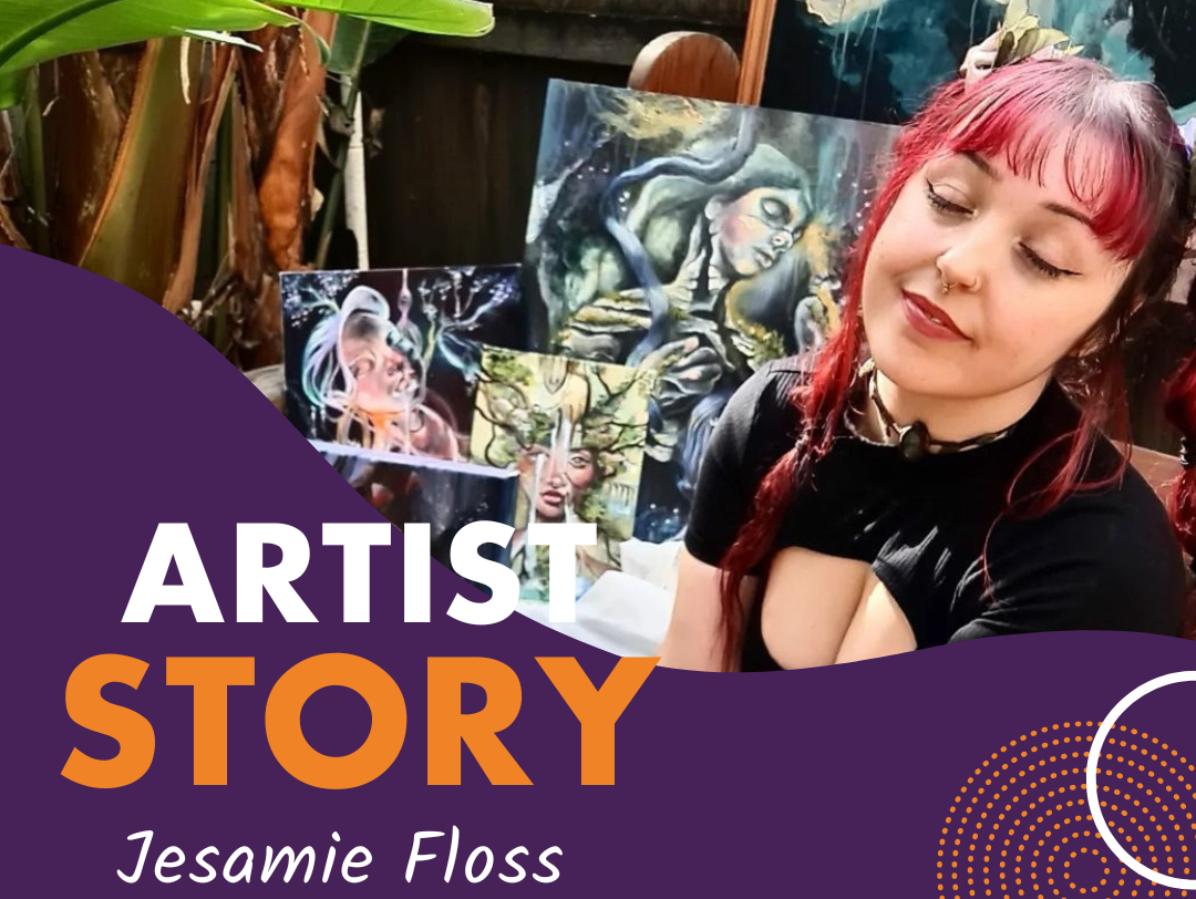 Jesamie Floss sitting nonchalantly by a collection of artworks with the sun shining on her face outdoors.