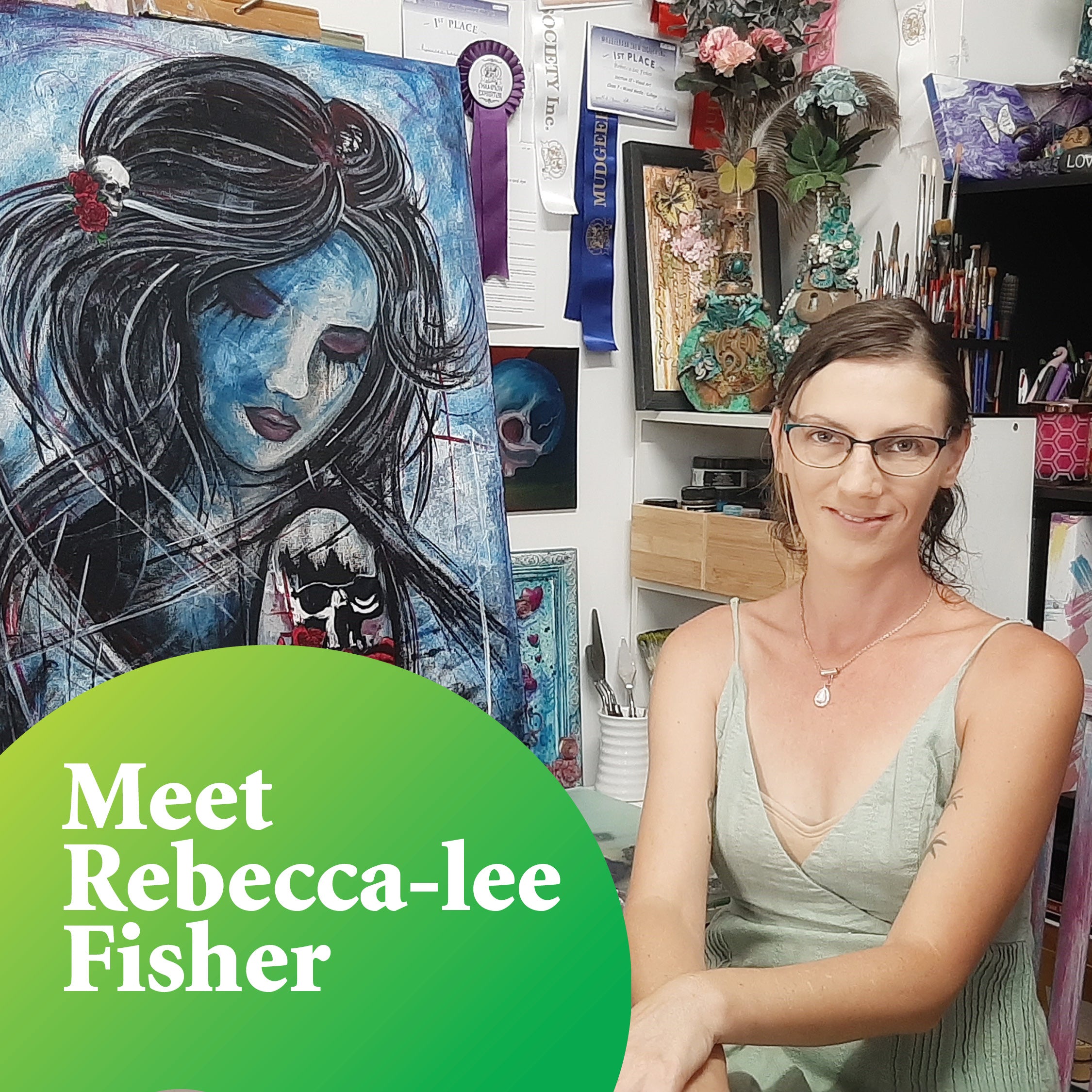 Rebecca-lee Fisher smiles at the camera with her self-portrait painting in the background
