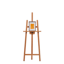 Load image into Gallery viewer, A small, framed artwork of a flower with an orange background, sitting on an easel. 
